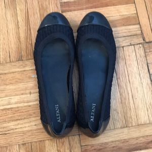 Navy blue alfani flats with cross weave detail.